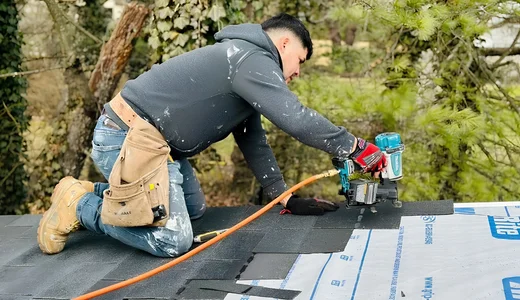 Roofing contractor installing shingles in New Jersey residential home by Ori Home Improvement
