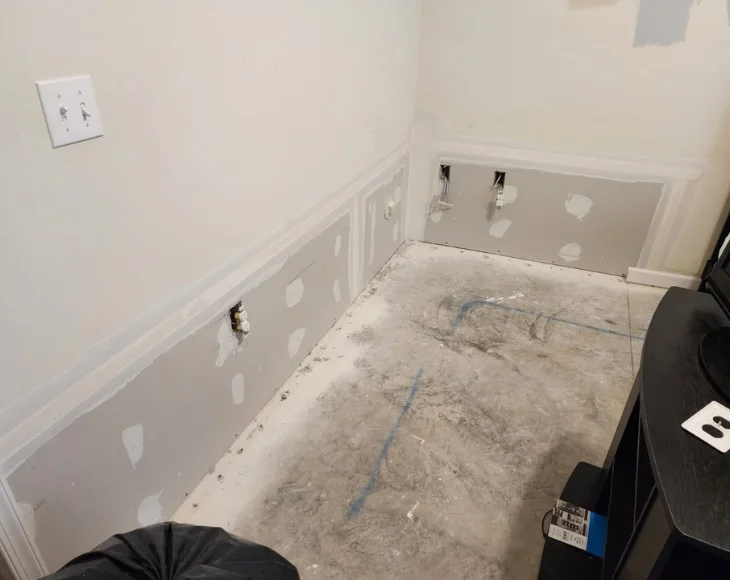 Water damage repair process in New Jersey home during restoration