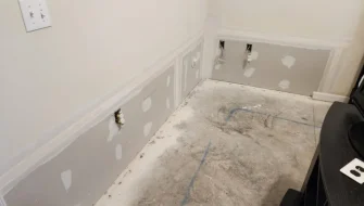 Water damage repair process in New Jersey home during restoration